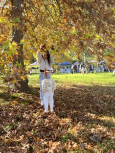 Emily Mai playing in the park with her child. 
